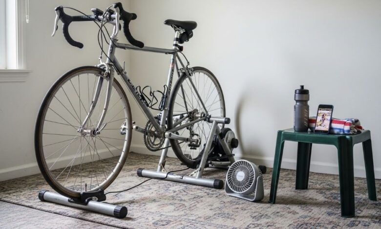 Indoor bike trainer stand with road bicycle mounted showing budget-friendly home cycling setup